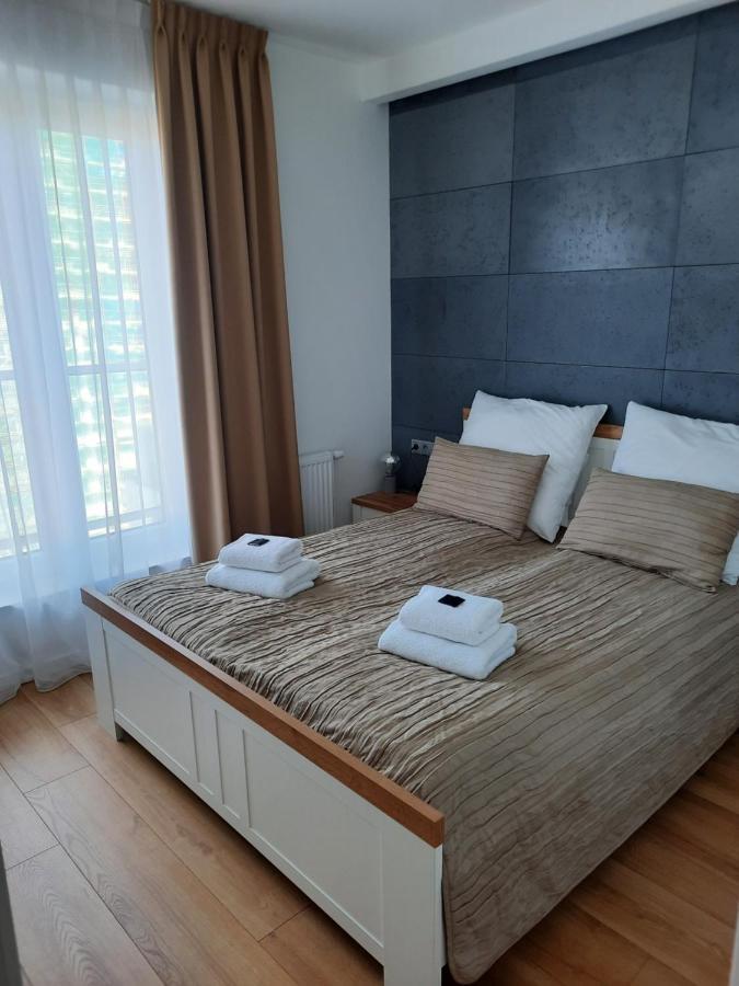 Aqua Apartments Sunset Reda Bagian luar foto