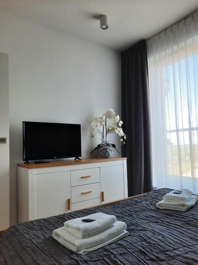 Aqua Apartments Sunset Reda Bagian luar foto