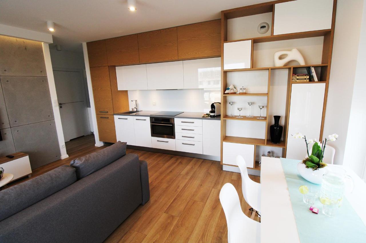 Aqua Apartments Sunset Reda Bagian luar foto