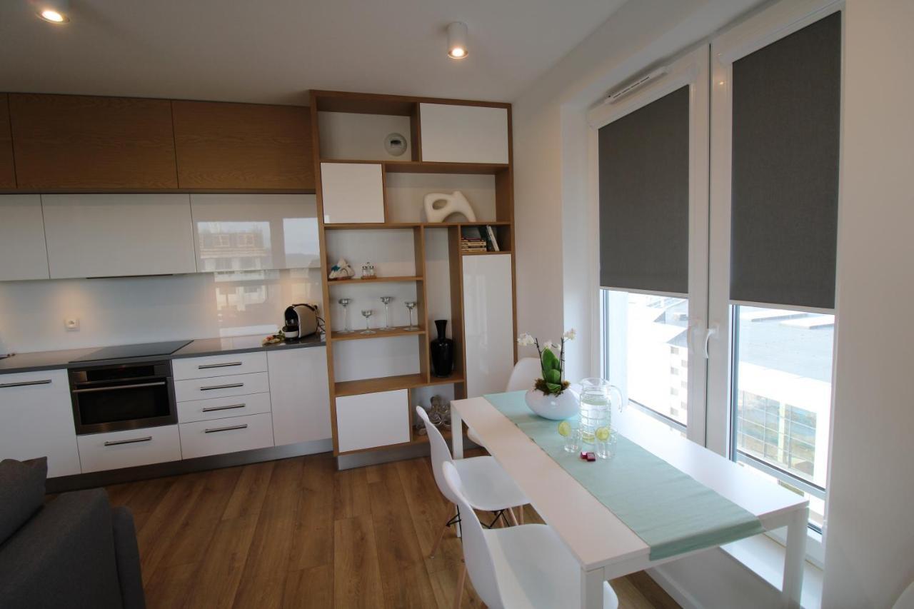 Aqua Apartments Sunset Reda Bagian luar foto